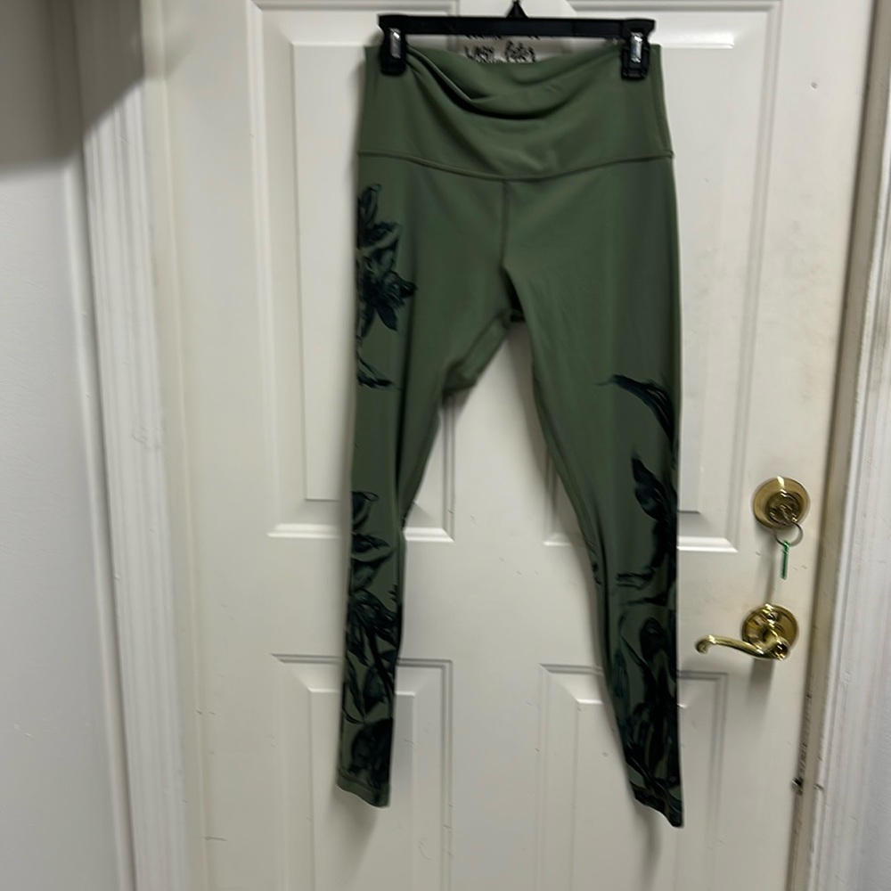 Lululemon size 10 , green and black leggings